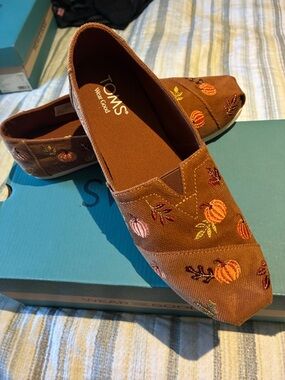 Toms Rust Brown Canvas Slip-Ons with Embroidered Pumpkins